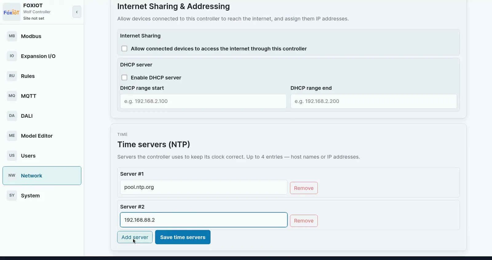 Wolf-App time servers list with pool.ntp.org as server 1 and a local time server as server 2